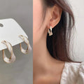 Cream White C-Shaped Earrings – Geometric Distortion Drop-Oil Design for Women